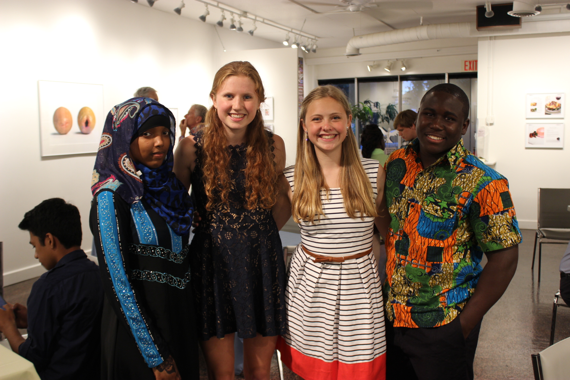 Students at a previous Youth Peace Award posing for a photo at ArtRage.